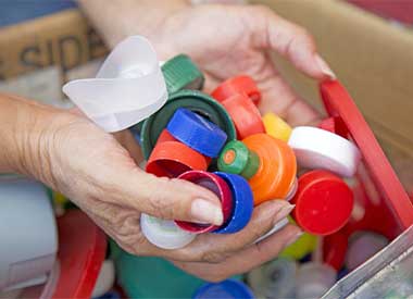 Collection of bottle caps for recycling