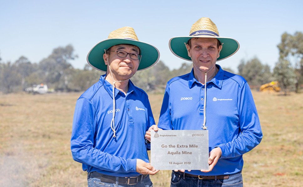 Two men with certificate