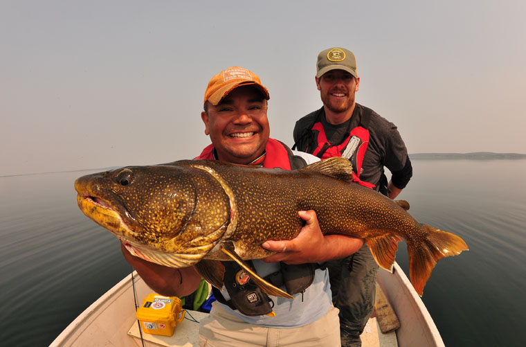 Two boys with fish