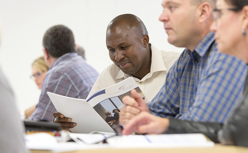 Man reading report